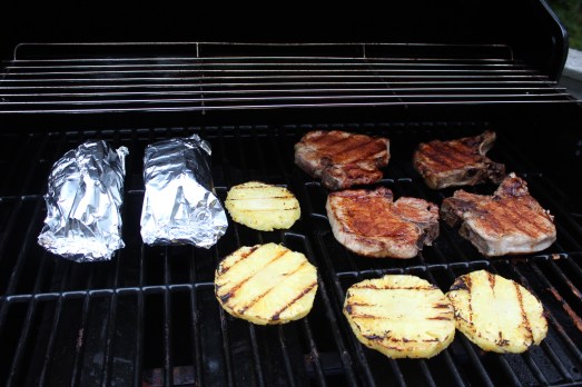 Potato packets on the grill. Everything cooks in about the same time..