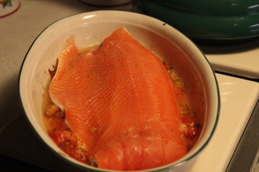 Lay salmon on top of tomato mixture.