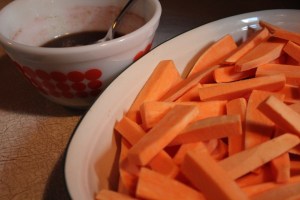 Cut sweet potatoes into thin wedges.