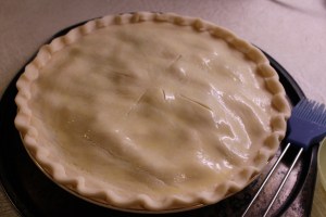 Lay on pastry top and brush with egg glaze.