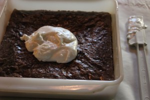 Spread peppermint cream over the brownie layer.