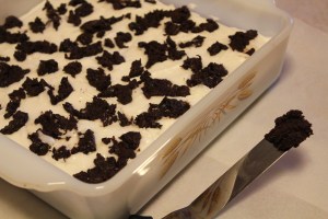 Spread, drizzle or "plop " chocolate over white layer.