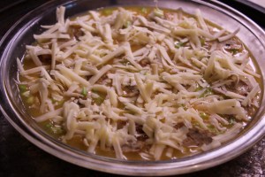 Sprinkle on shredded cheese before baking.