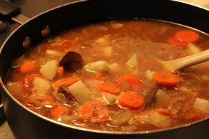 Add in carrots and potatoes and cook till tender.