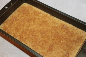 Before baking sprinkle the top of bread heavily with sugar for a nice crunchy top.