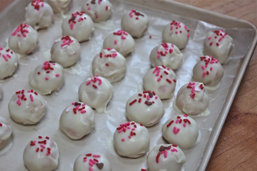 Dip into melted white chocolate, decorate with sprinkles.