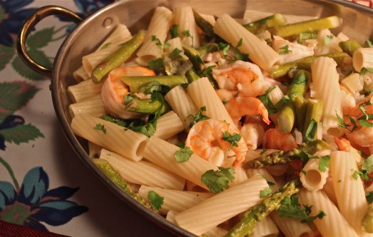 Shrimp, lemon juice, and then pasta added.