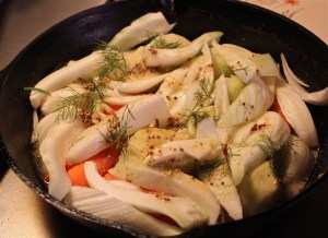 Place vegetables on the bottom of the pan.