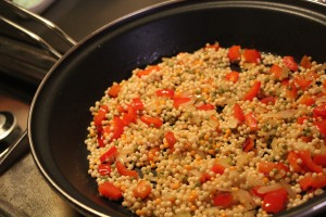 Saute onion and pepper, then add couscous.