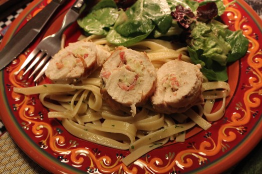 Chicken Roulade served over fettuccine.