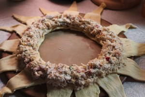 Spoon chicken salad onto wide ends of triangles.