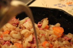 Pouring in the cream.