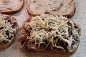 Layer up the ingredients on the rye bread.