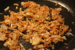 Cook onion and garlic with seasonings. 
