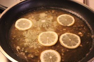 Finishing the sauce with butter and lemons.