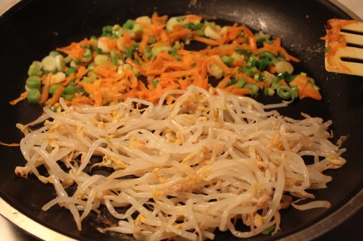 Stir fry vegetables, then add noodles, shrimp and egg.