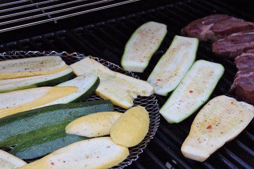 Squash slices on the grill.