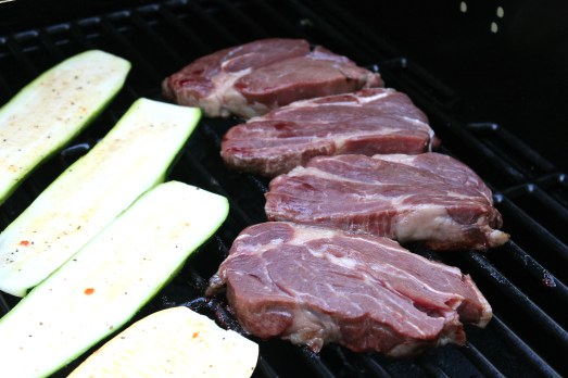 Lay steak on the grill glazed-side down.