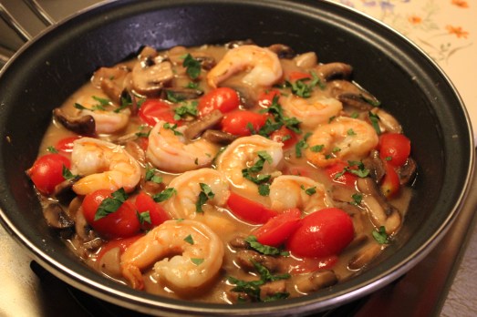 Add the shrimp back into the mixture, plus parsley and cheese.