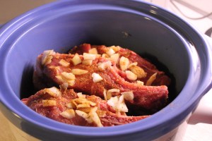 Ribs in the crockpot, all seasoned and ready for some slow cooking.