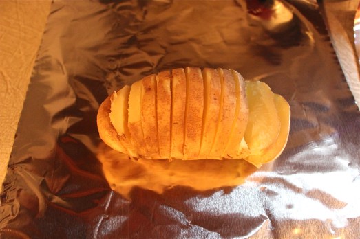 Potato cut into slices ready for seasoning.