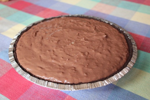 Pour the chocolate filling into a crumb crust.