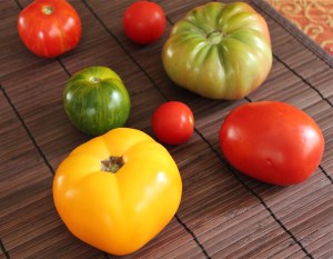 Heirloom tomatoes in many sizes and colors.