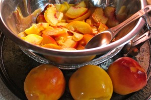 Cutting up the peaches.