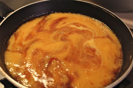 Add peach puree and blend in thoroughly.