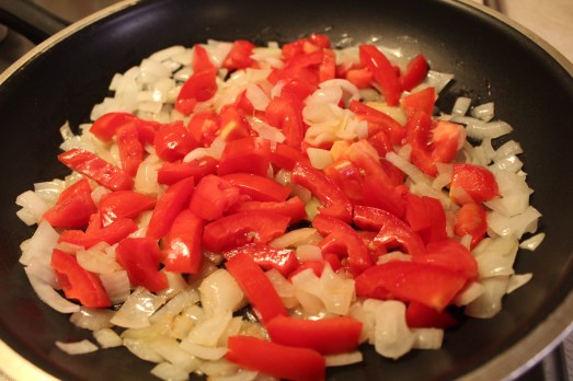 Saute onions with peppers. 