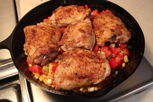 Nestle the chicken pieces on top.