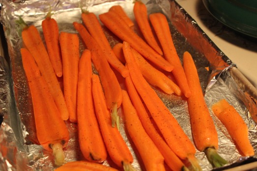 Baby carrots, drizzled with olive oil, salt and pepper.  Bake at 400*F for 20 minutes.