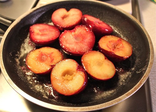 Sauté the plums in butter and sugar.