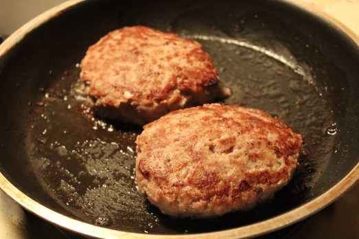 A hot pan will give a nice sear to the burgers.
