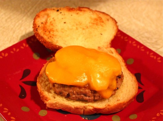 Turkey sage burgers with sautéed apples and cheese.