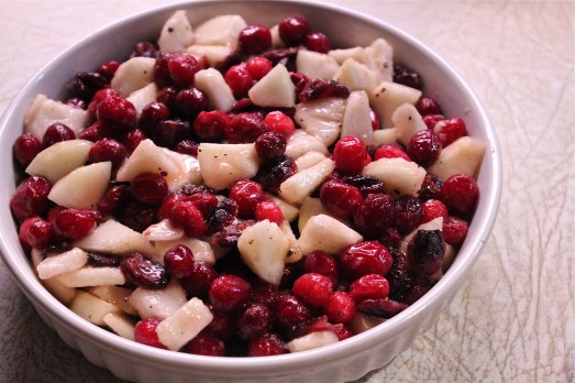 Arrange mixed fruits in a baking dish.