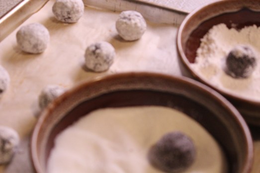 Roll first in regular sugar, then in powdered sugar.