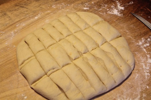 Divide the dough into 24 equal pieces.  (good luck with that!)