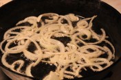 Fry onions in a single layer.  Don't crowd the pan.