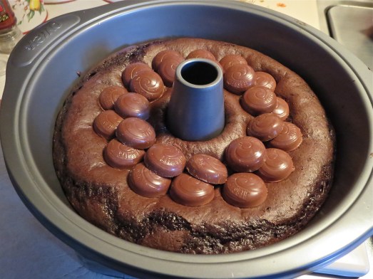 Place the caramels in a ring over the top of the partially baked cake.