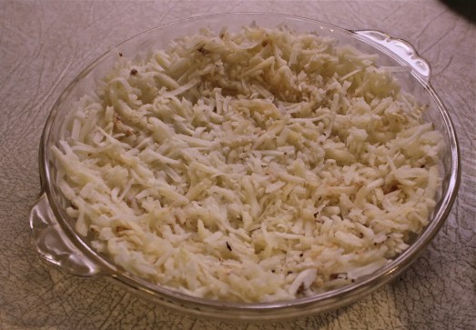 Spread the potatoes out to form a crust.