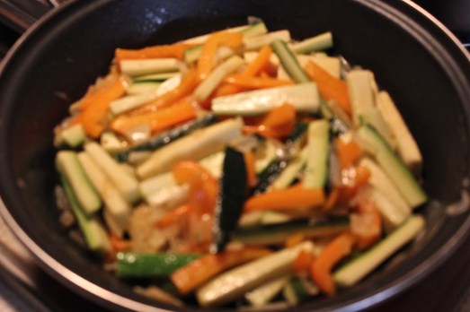Sautéing the vegetables.