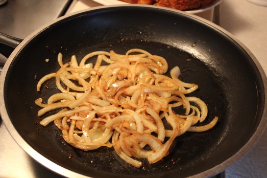 Getting the onions golden and softened.
