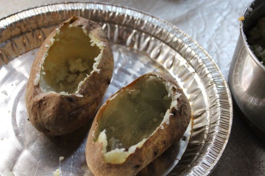 Scoop out most of the potato, leaving a shell.