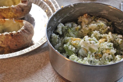 Mix potato with cooked broccoli, greek yogurt, milk and cheese.  