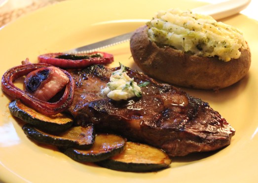 Grilled Steak with Vegetables and Lemon Herb Butter