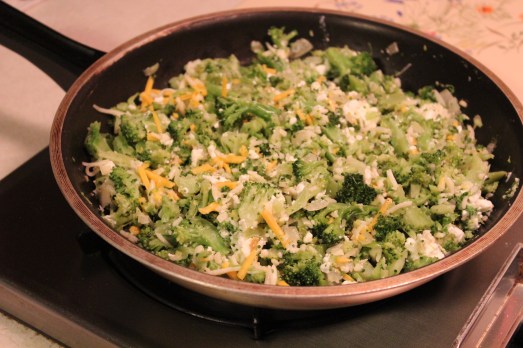 Add cheeses to broccoli mixture.