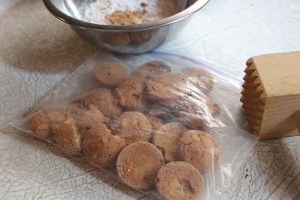 Crush cookies by putting in zip-bag, and crushing with a meat tenderizer  or rolling pin