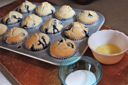 Brush tops with melted butter and sprinkle with sugar.