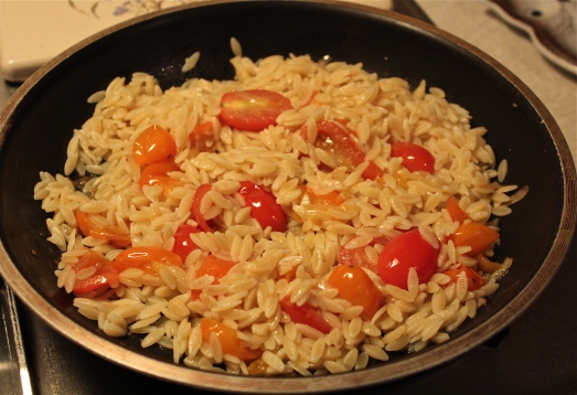 Add the cooked orzo and stir to combine.
